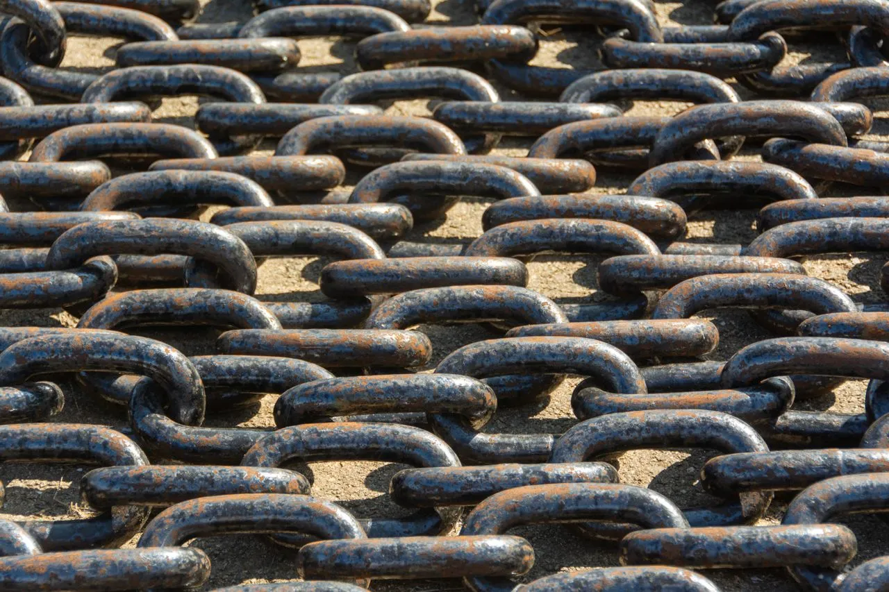 Rows of heavy, rusted chain links